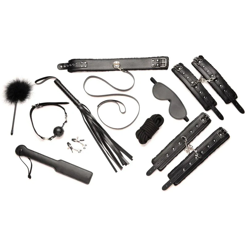 Collection of black bondage accessories on a white background